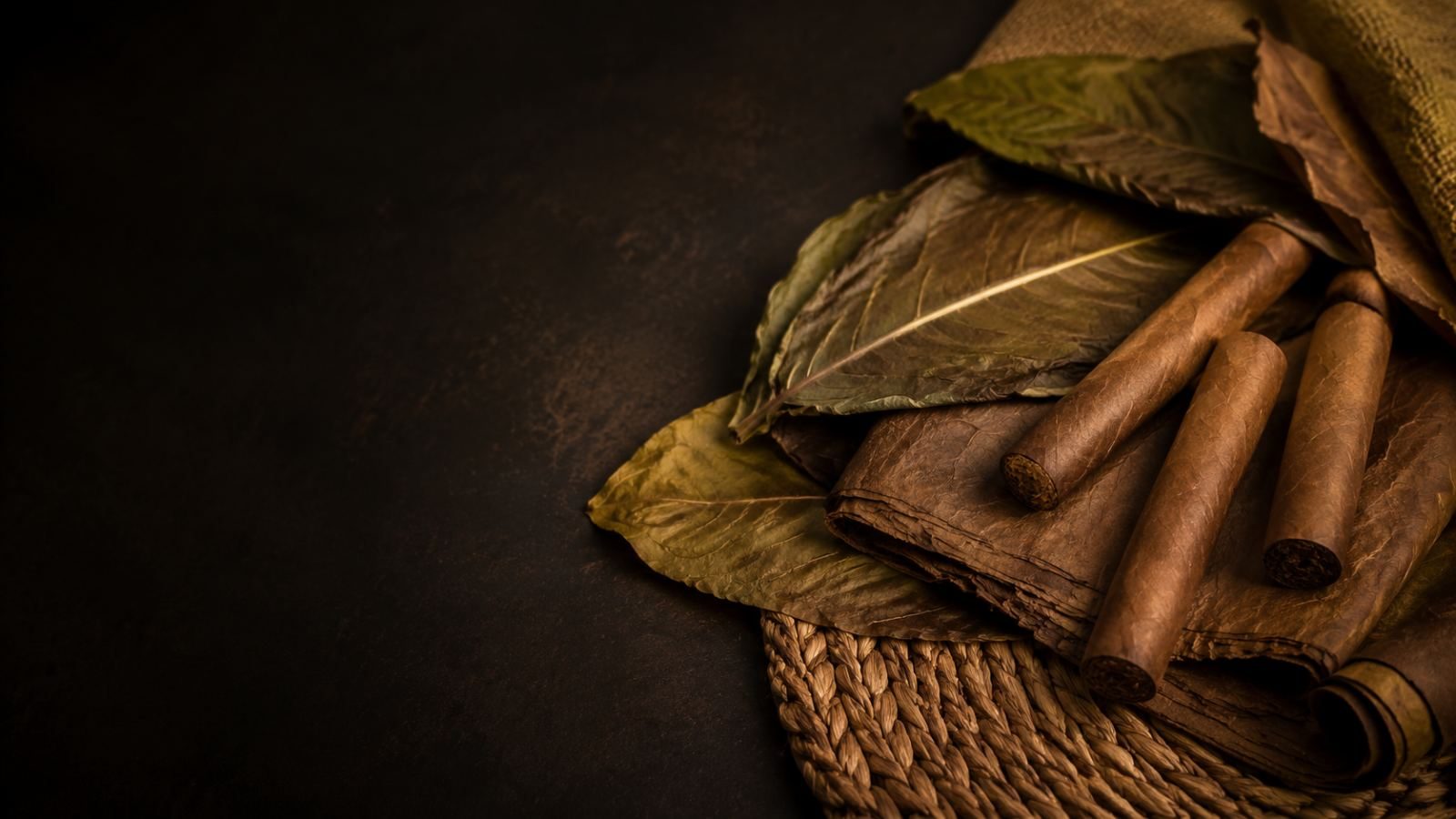 Stacked cured leaf and cut tobacco
